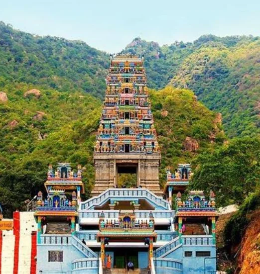 A wonderful Hindu temple stands tall in the mountains flowing with majesty and spirituality