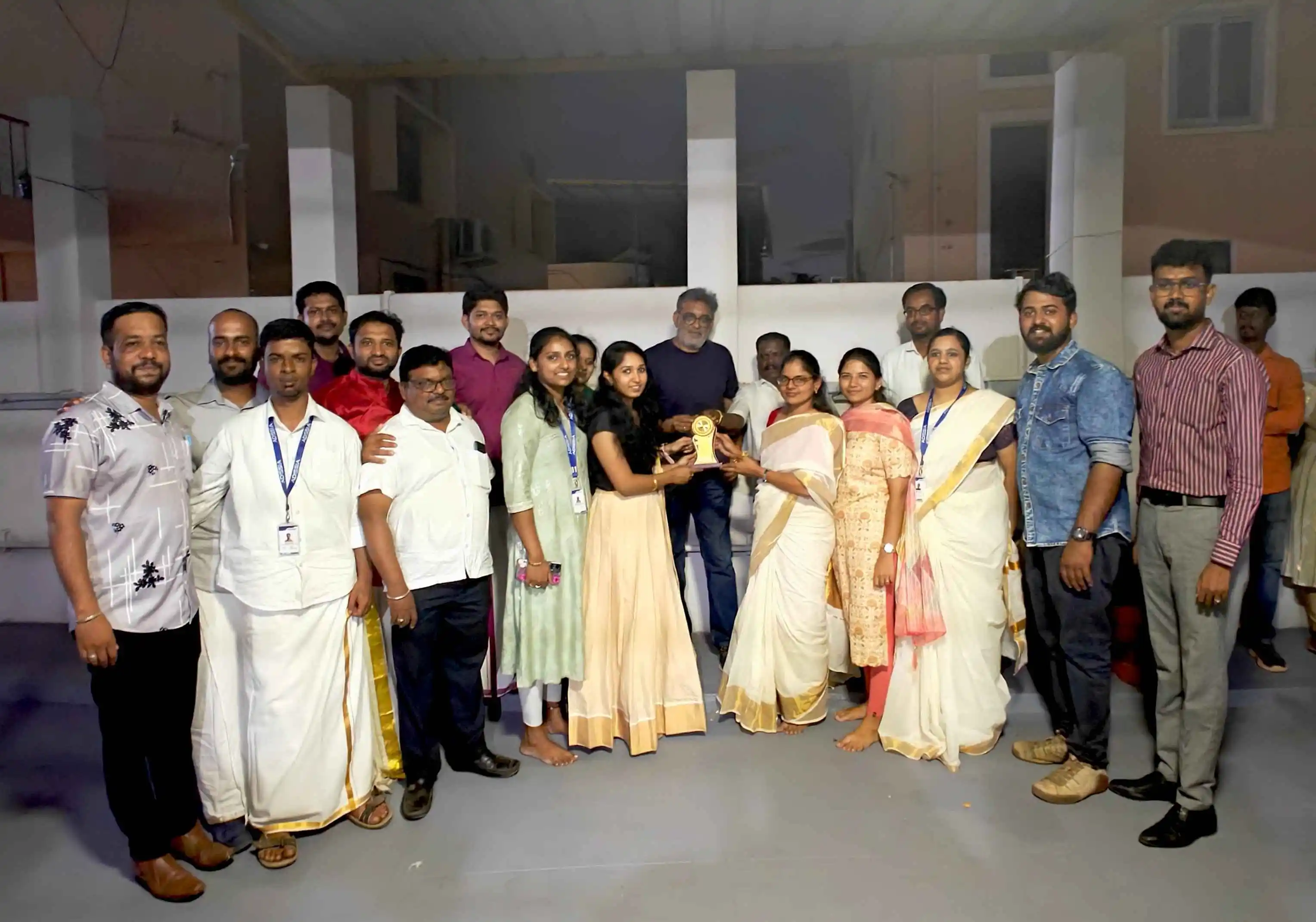 Presenting awards during Onam festival celebration