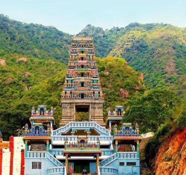 A magnificent Hindu temple towers towering in the highlands, brimming with majesty & spirituality