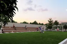Top Residential Lands With Playgrounds For Kids in Tirupur A green playground is designed for both adults and children to enjoy various activities.